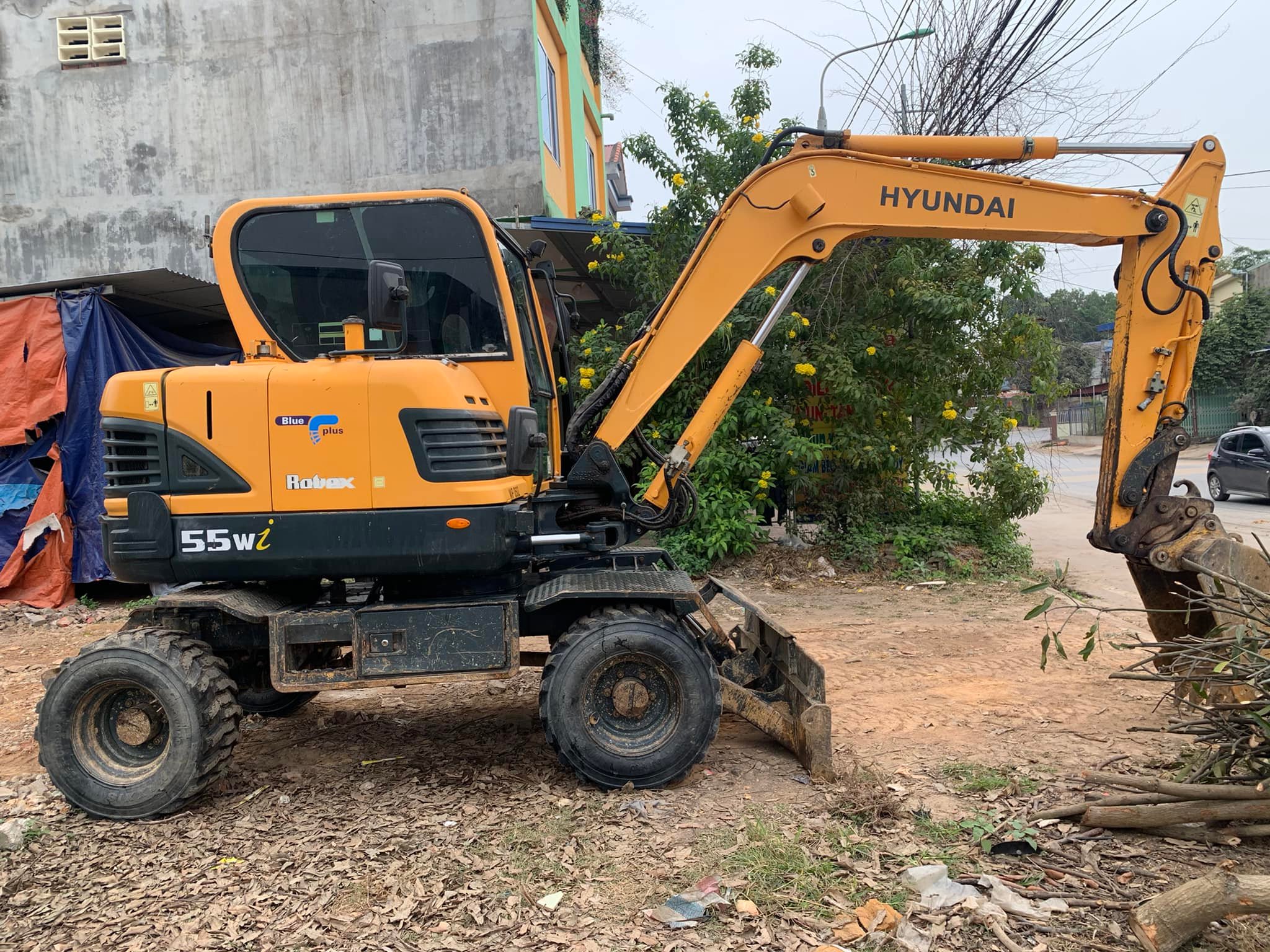 MÁY XÚC ĐÀO BÁNH LỐP HYUNDAI ROBEX 55W